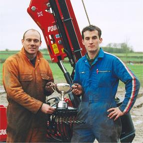 Steve Craddock and Andy Hooper next to machinery